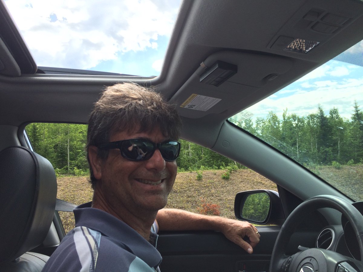 managedchaos's tweet photo. An open road ahead of us, sunroof open and this guy make for a great travel day. #summer2018 #roadtrip #friends #NB https://t.co/bzpoS1vCAF