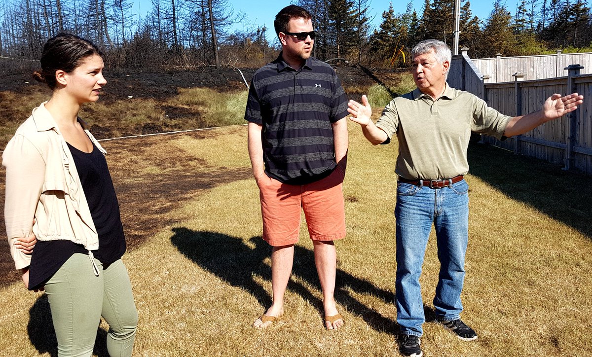 JonnyHodds's tweet photo. Maggie Hynes, Sean Simmons, and Mac Blundon say yesterday's fire could have been much worse if not for the effort of the fire crews, water bombers, and the residents working together. @KrissyHolmes @Fred_Hutton @sjmorningshow @CBCNL #cbcnl #KenmountFire #KenmountTerrace https://t.co/sew6xcQfh2