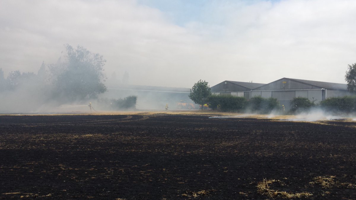 SuffolkFire's tweet photo. This afternoon @SuffolkFire we have dealt with a #fieldfire #stanningfield #BuryStEdmunds the incident is now concluded. It involved 8 appliances #firefighters a #commandSupport vehicle and a #unimog Great effort by all involved saving #farmBuildings #fireaware #FireSafety https://t.co/HVWqDQkrT3