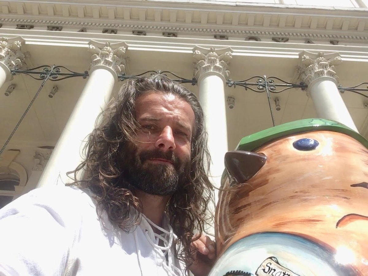 EzekialBone's tweet photo. Mr Bone, fresh from #MagicLantern Backstage Tour @RoyalNottingham meets one of the #Hoodwinked2018 #Robins outside the Theatre Royal. Keep your eyes peeled for more around the City. Great to see culture on the streets. #NottinghamRocks @VisitNotts https://t.co/ayOvbxiZR8