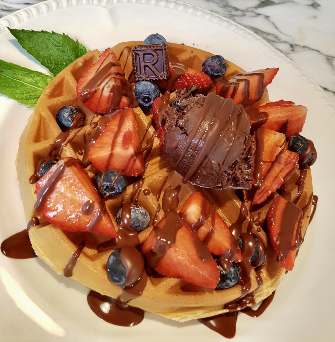 Berries &amp; Chocolate Waffle from <a href="/RChocolateLDN/">R Chocolate London</a> - Dark Chocolate Ice Cream, fresh berries with a garnish of dark chocolate sauce. Irresistible!
#chocolate #strawberries #blueberries