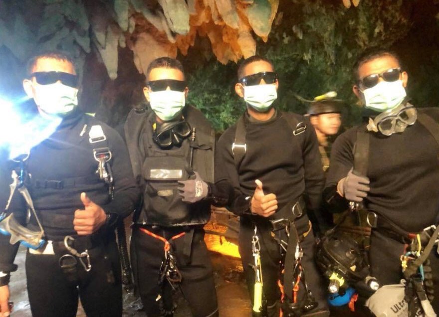 Kai_xen's tweet photo. The four men who stayed with the kids in the cave since they were discovered are out. Sunglasses because they haven’t seen light for over a week. Heroes
#thaicaverescue https://t.co/RWIqYaDpfY
