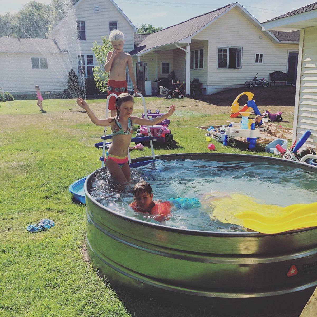 I’m always happy when I can get all five kids in one shot playing independently in their natural habitat. 😊 #stocktankpool #swimmingpool 
#mommyblogger #candidchildhood #magicofchildhood #mytinymoments #acupofmotherhood #childhoodunplugged