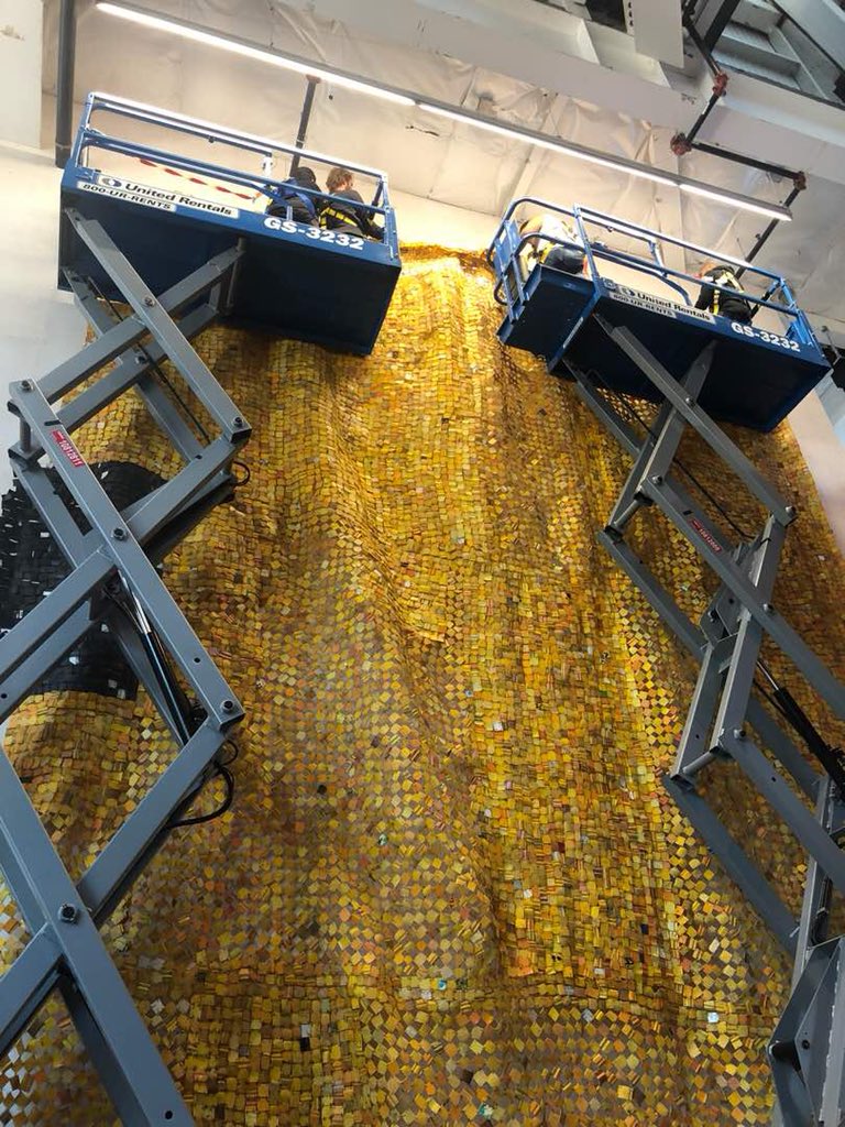 NanaSirOsei's tweet photo. Serge @attukwei Clottey installing his new @facebook commissioned work at the new Facebook headquarters building in San Francisco! #art #contemporaryart #afrogallonism #ghana https://t.co/hXEnO2i8mR