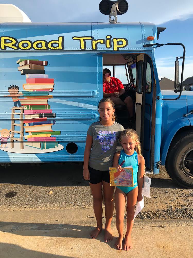 Our <a href="/CabotBookmobile/">Reading Road Trip</a> is a big hit on Tuesday nights when it makes its way through neighborhoods! Looks like these sweet kiddos picked out some cool books!