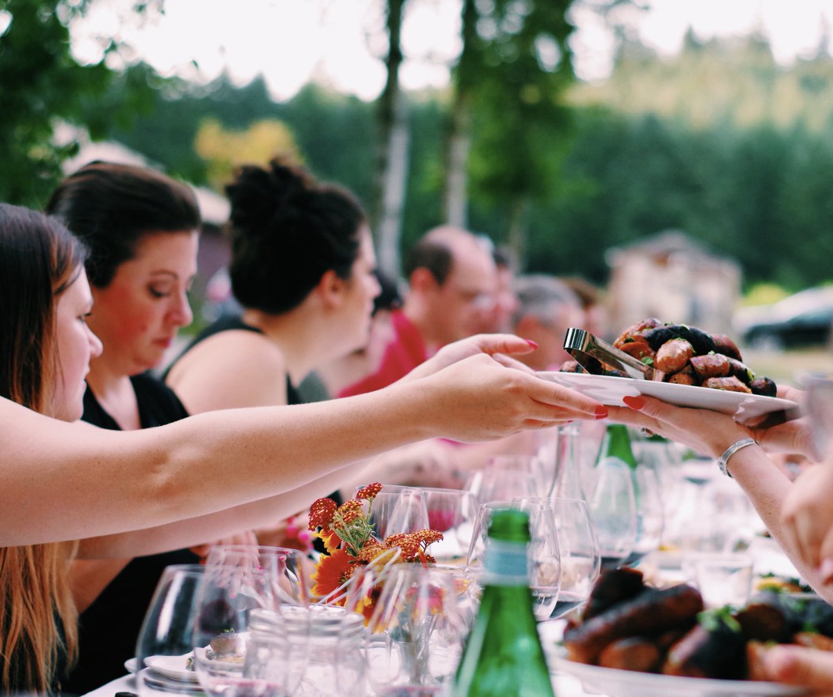 Alfresco, family-style dinners - a great way to meet new people and enjoy a lovely meal.