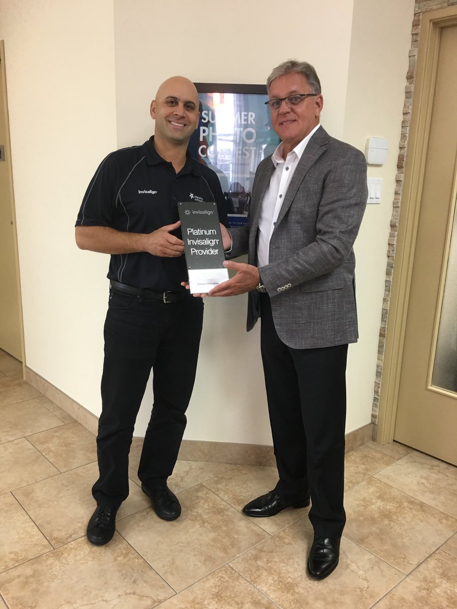 Orleans_Ortho's tweet photo. Congrats Dr. Saikaly! Today he received the next level in @Invisalign status (Platinum Invisalign Provider) here receiving his plaque from Mr. Lefort. Visit https://t.co/oMmeENcLQl to learn more about how Dr. Saikaly can transform YOUR smile! π #PlatinumInvisalignProvider https://t.co/XDBsC8NMX5