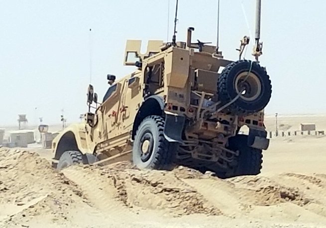 155ABCT's tweet photo. @1_98CAV Conducting driver's training in their M-ATVs outside Camp Buehring, Kuwait. our focus on #UnifiedLandOperations makes our lethal teams more prepared for both #asymmetric and #conventional threats! @OshkoshDefense @nationalguardMS https://t.co/8TO4zLiDiL