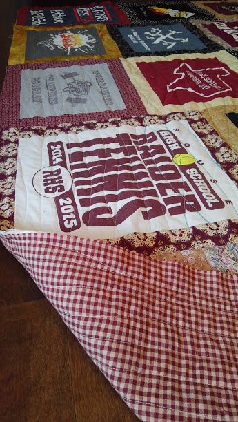 Ms_Gazella's tweet photo. Just delivered my first commissioned work to the one and only Cherokee Ford! I had a lot of fun turning her four years of Rouse t-shirts into a memory quilt. 😀🤞🧵One month from now it will be in a Sam Houston State dorm... 😧 https://t.co/2uId8xet2T