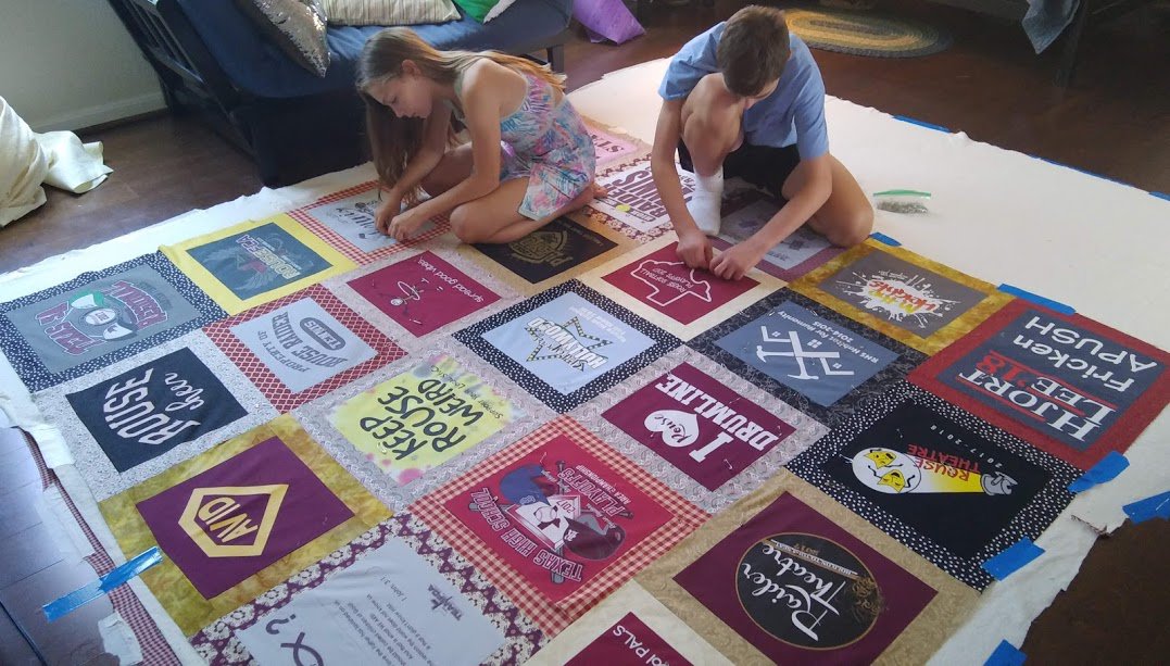 Ms_Gazella's tweet photo. Just delivered my first commissioned work to the one and only Cherokee Ford! I had a lot of fun turning her four years of Rouse t-shirts into a memory quilt. 😀🤞🧵One month from now it will be in a Sam Houston State dorm... 😧 https://t.co/2uId8xet2T