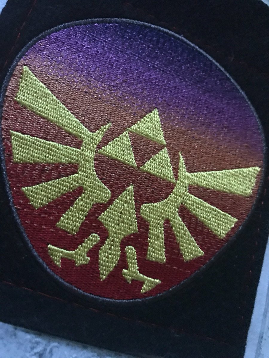 evetopus's tweet photo. Playing with gradients on my machine, not sure if like yet. Changing the shape on the next stitchout to be more shield-like, definitely. Feels like a pixely old TV in a way https://t.co/AfUkGaRqeB