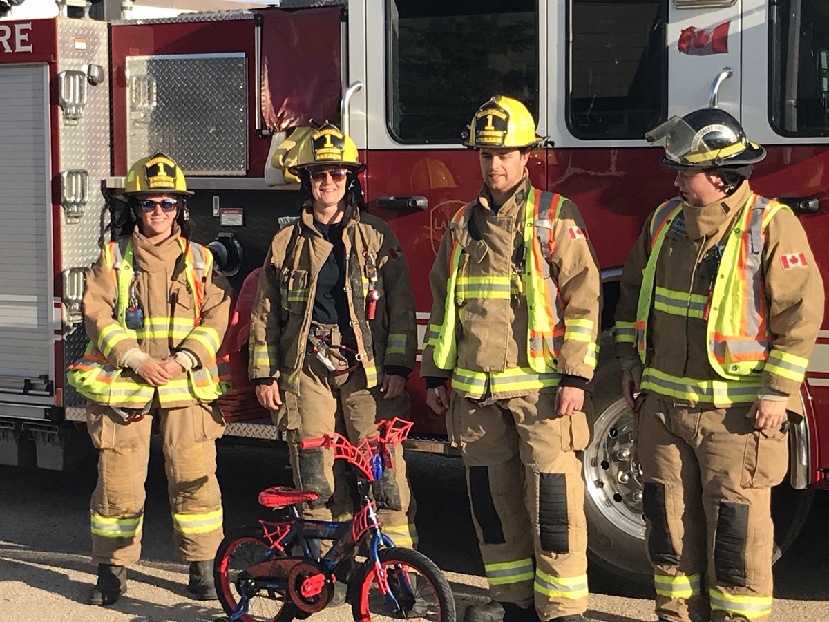 LSRFS's tweet photo. Yesterday firefighters responded to a boy with his foot stuck in his bike after some quick cuts he was out and unharmed but the bike was a little worse for wear so today the firefighter society decided to get Jayden a new one, now he’s back riding and doing well. https://t.co/9DvsixJpyX