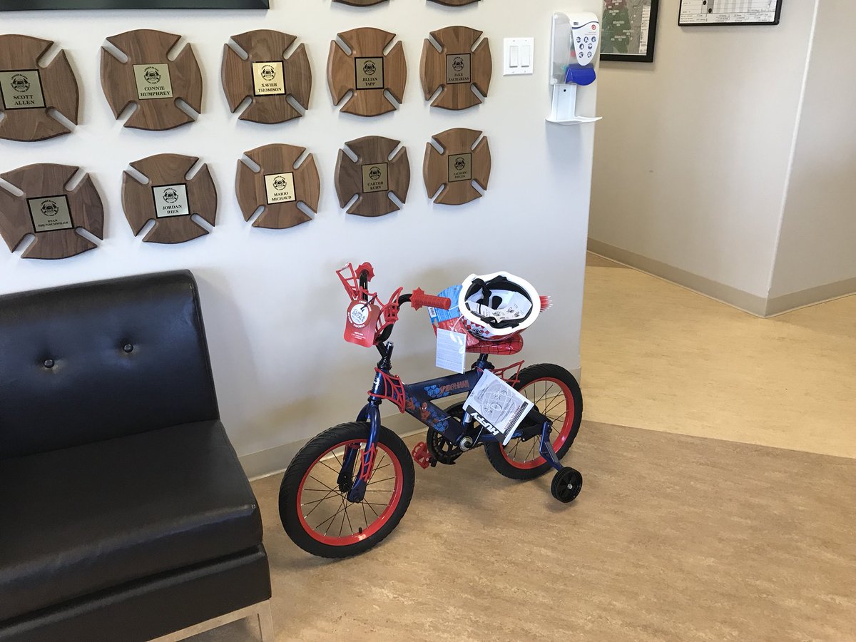 Yesterday firefighters responded to a boy with his foot stuck in his bike after some quick cuts he was out and unharmed but the bike was a little worse for wear so today the firefighter society decided to get Jayden a new one, now he’s back riding and doing well.