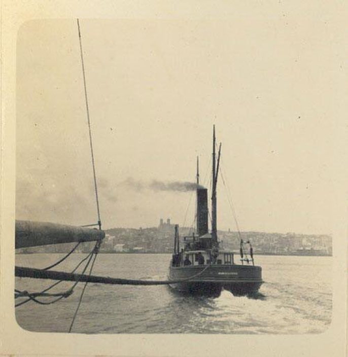 "We tow into St. John’s", taken June 26, 1893 by Eliot Curwen.
