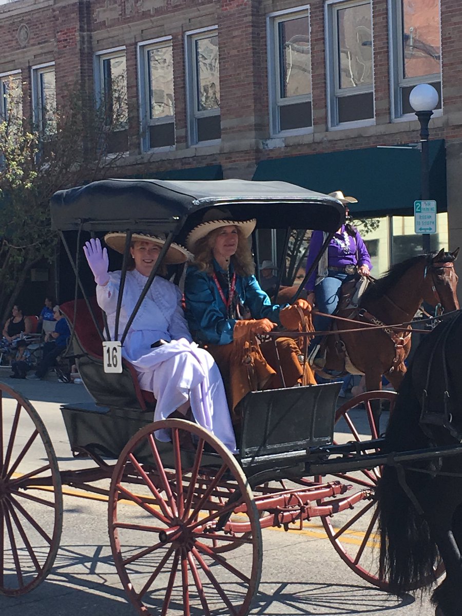 Mary riding in the carriages at the #CFDRodeo Grand Parade