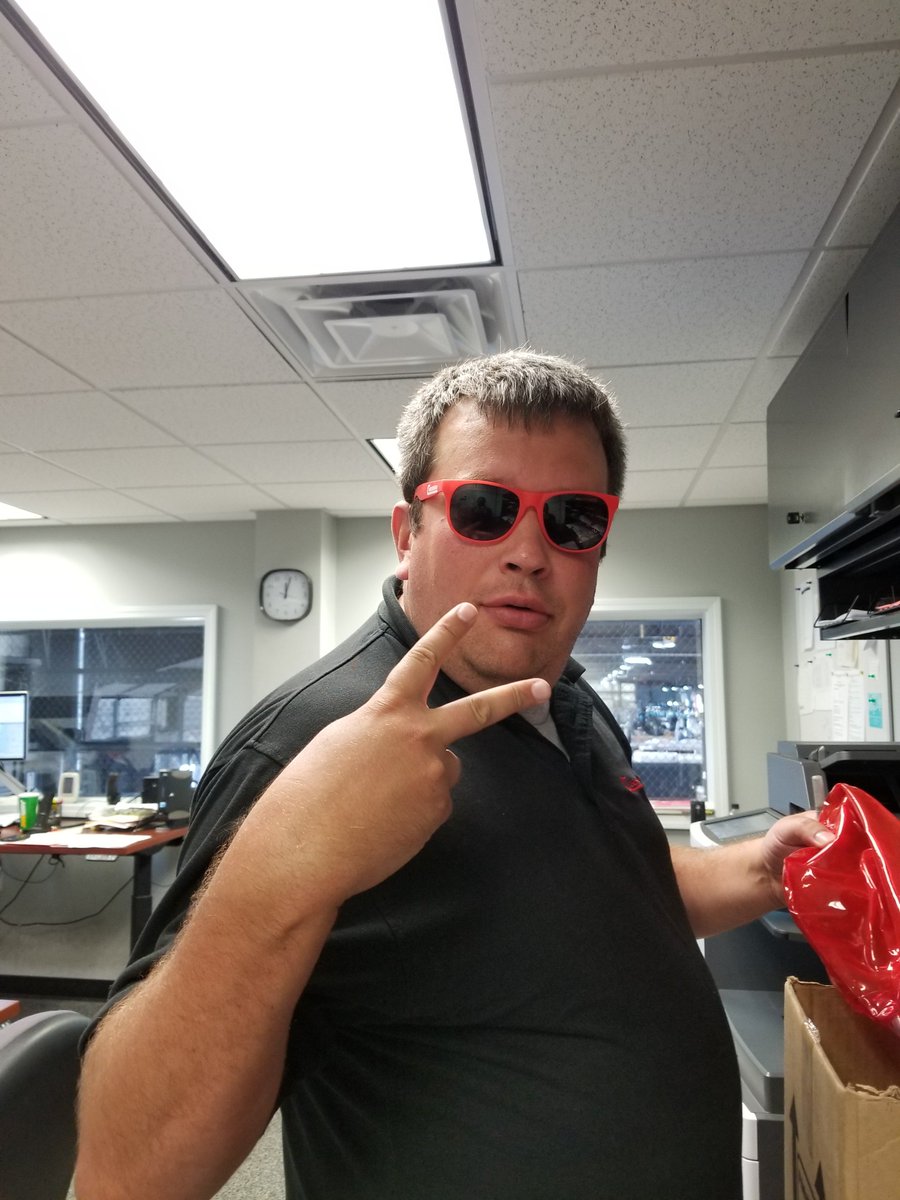 CheesemanLLC's tweet photo. One of our dispatchers trying out our new giveaways for the upcoming parades! https://t.co/ubBvnmEw71