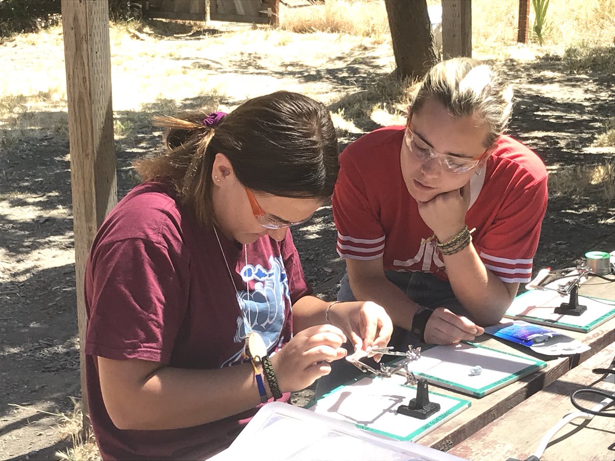 marinahpark's tweet photo. Visited our maker zone @GSNorCal Camp Bothin — campers soldering flashlights! Also: rubber band cars, lanterns, scribble bots, gliders, and wearable art. Great to see Maker Zone filling up at free choice time — right in there with pool party, archery, ropes, and fairy houses! https://t.co/j7qf8q6RiW