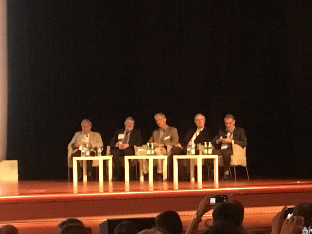 CommsPhys's tweet image. And panel is about to start in a packed theatre where young and not so young, experts and lay people have gathered to learn from those who have made history in #physics at #icap2018