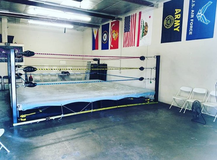 SantinoBros's tweet photo. The Santino Bros Wrestling Academy just got an upgrade! We now have an office, additional seating in our second unit, and the neon ropes are back in our main dojo. What do you think? https://t.co/QXtqOOGSbu