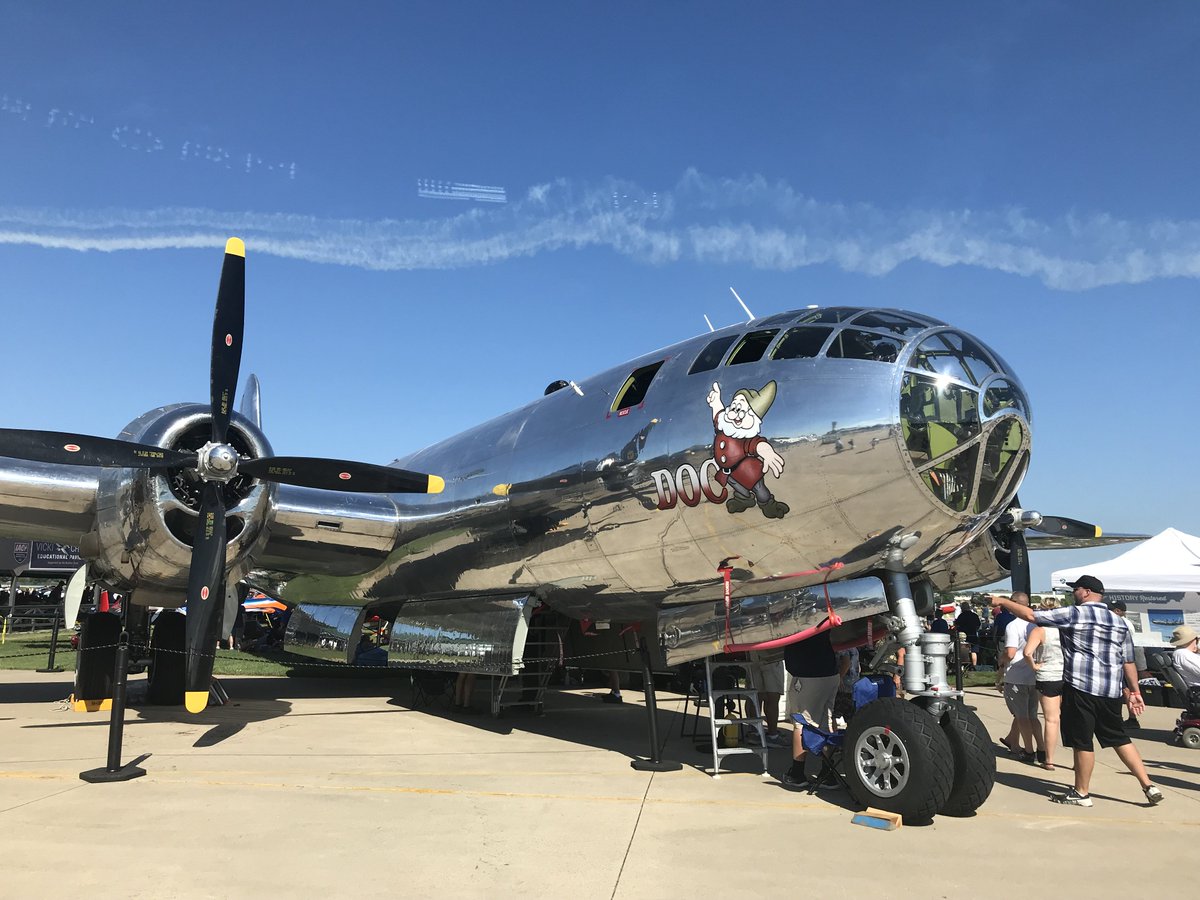FlyQEFB's tweet photo. What does the Seattle Avionics team do after a full day at #OSH18 talking to customers about planes and avionics?  Walk around and look at amazing planes, like this B28 and this baby B17 (1/3 scale), of course! https://t.co/XAOx2rLelS