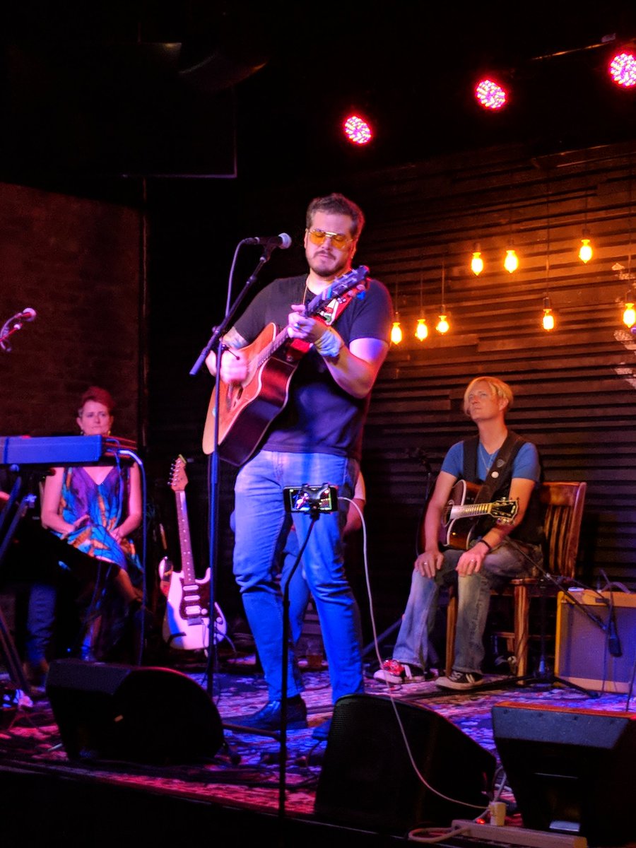 FrontPorchMI's tweet photo. Is the #FrontPorch back?! Not exactly, but it was a mini reunion of sorts when #JanThompson, @SteveTaylorMI and Brion Riborn of @BarelyonMusic took the stage for #SingersInTheRound at @OtusSupply. #ferndale #songwriters #livemusic https://t.co/v0pkSWaw77