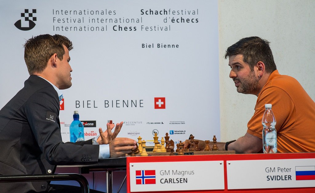 chess24com's tweet photo. Mamedyarov beat MVL in Round 3 of #BielChess2018 &amp; Navara beat Georgiadis, but the game of the day was the Carlsen-Svidler draw! https://t.co/nSGoTWZiAi #c24live https://t.co/GeeTKBRNGA