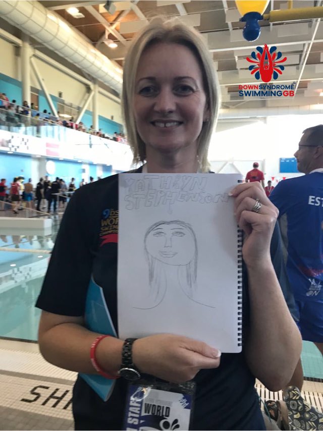 DSSGB1's tweet photo. DSSGB team doctor KATHRYN STEPHENSON poolside at Down Syndrome World Swim Champs 2018 Canada captured for posterity by budding artists LAURA LOGAN and CERYS McCRINDLE between swimming fantastic PBs #SoManyTalents #CommissionsAccepted β¦@NCL_SwimTeamβ© @SDS_sport https://t.co/cuIcs5PXBI
