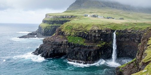 QuotientTP's tweet photo. The #FaroeIslands may be quite a distance away but the journey there is more than worth the effort. This is just one of the few mesmerising landmarks we saw during our time there! https://t.co/DHHN1h2A8w