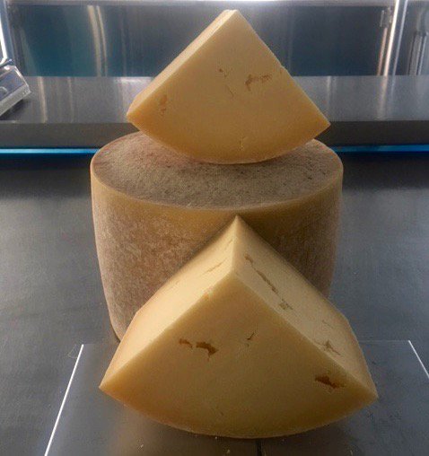BarwheysDairy's tweet photo. Though I say so myself - the #Barwheys Cheese that I'm cutting this morning is particularly yummy. Made 20/6/17 when there was lots of clover in the fields so bright yellow and really flavoursome. Lucky customers of @BraeheadFoods ... https://t.co/FxdxQvPAVy