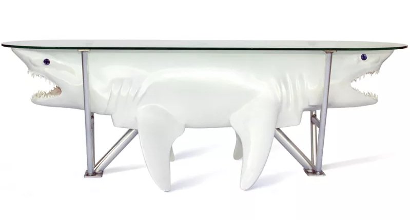 PhillipsatWork's tweet photo. We have been so excited about #SharkWeek here at Phillips that we have been trying to talk management into replacing our conference room table with this shark table. What do you guys think? https://t.co/6hrIw5ndzY