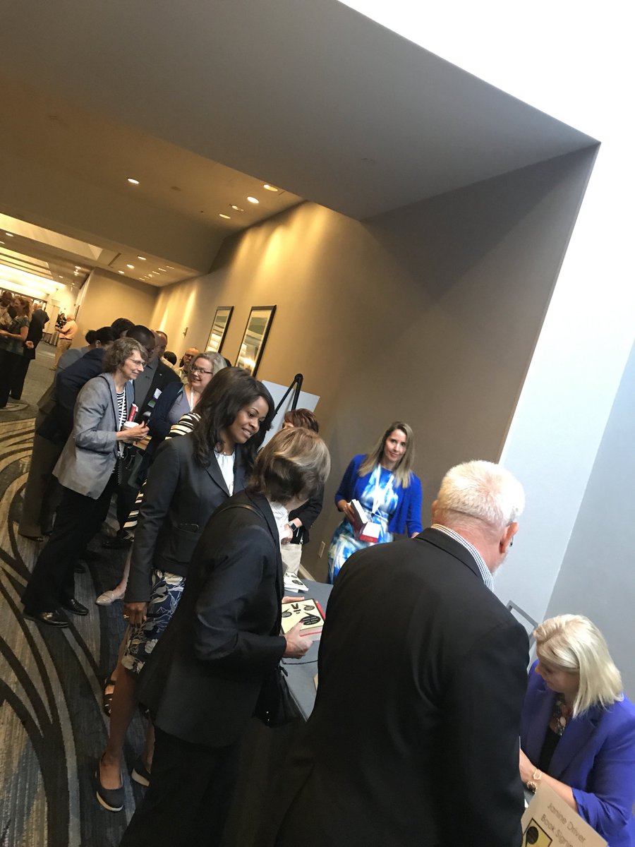 NACWA's tweet photo. Janine Driver signing books after a powerful and inspiring talk on body language and communication in life and career, the crowd was obviously impacted #18nacwa #CleanWaterIsOurLife https://t.co/8d6w9wH4RK