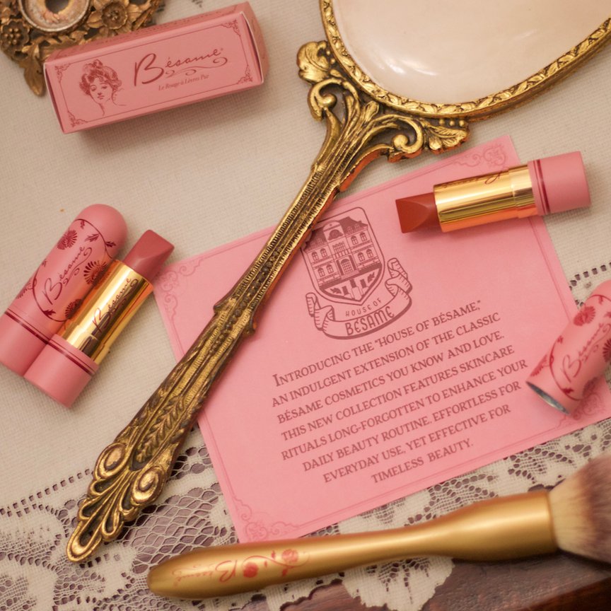 BesameCosmetics's tweet photo. The newest product in the Bésame family, our Sheer Color Lipsticks will be the perfect addition to any Bésame collection! The pretty pink metal tube features our classic Chrysanthemum pattern &amp;  gold inside. 📸: @MissVintageLady  #CosmeticHistoryWeek #HouseofBésame #sheerlipstick https://t.co/H3AxulTZS2