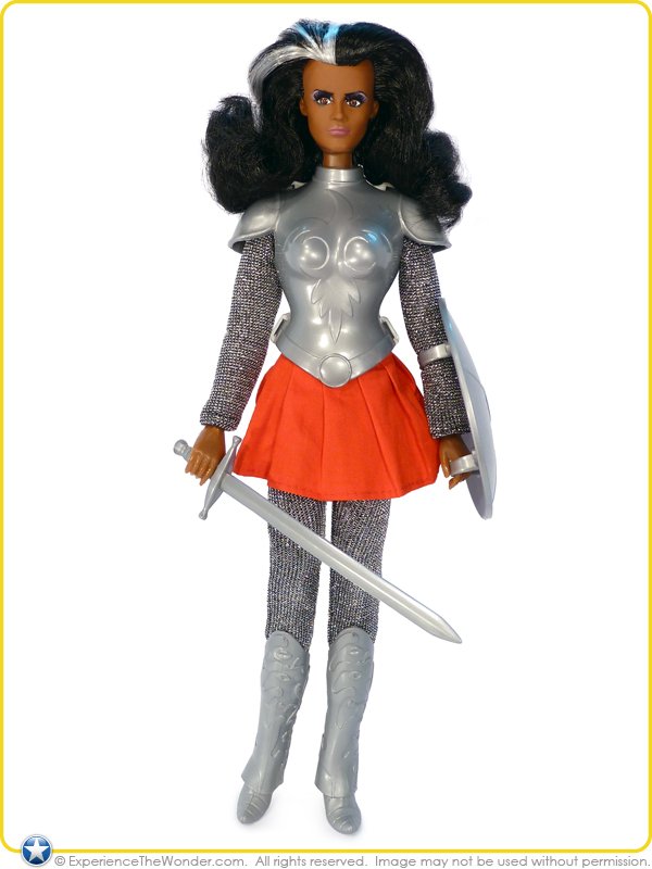 In the same year, the Mego Corporation produced a Nubia doll to tie-in with the show, advertised as "Wonder Woman's super-foe". Wearing a gladiator-styled costume modeled on one that Graves would have worn in the series, and resembling a uniform Nubia wore in the comic book...