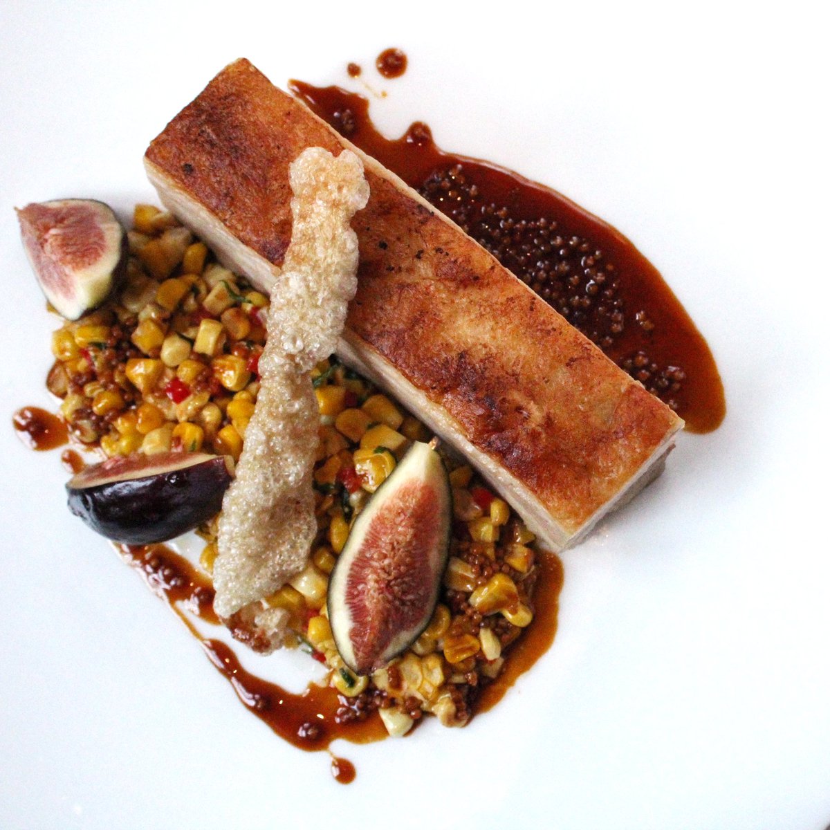 Sneak preview from our @nycrestaurantweek menu: Crispy pork belly with black mission figs, corn salsa, and mustard jus
