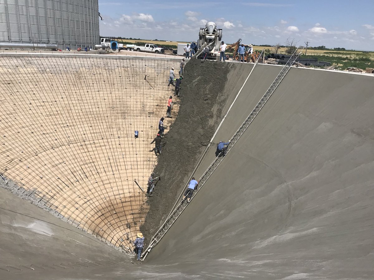 Pouring the cone for a new grain bin

Pretty darn impressive
