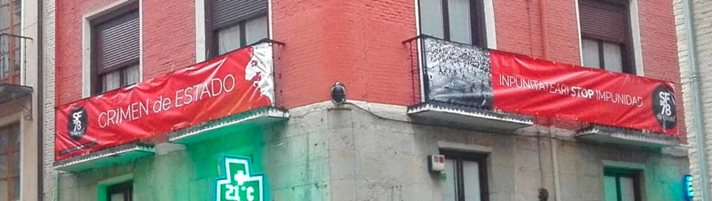 URGENTE: La Policía Nacional ha llamado a declarar a por un posible delito de "injurias al Estado" a varias personas que habían colocado en sus balcones pancartas denunciando la impunidad de los sanfermines 78. #SF78