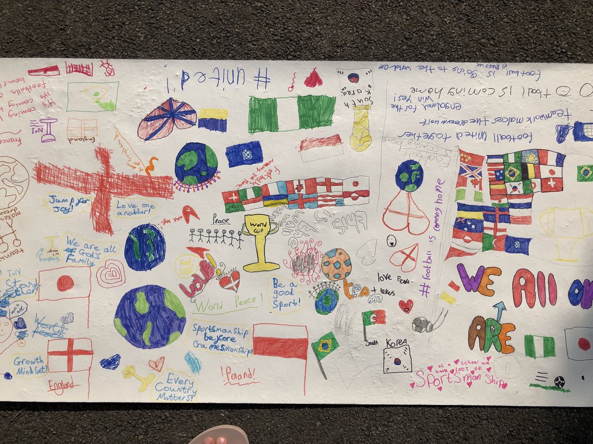 MissRReece's tweet photo. What a beautiful homage to the #WorldCup and an #unitedworld! It was all about #peace and #love today in KS2 @StMarysRCSch when we celebrated the World Cup and how it’s bringing so many people #together https://t.co/bFnNYgwG5w
