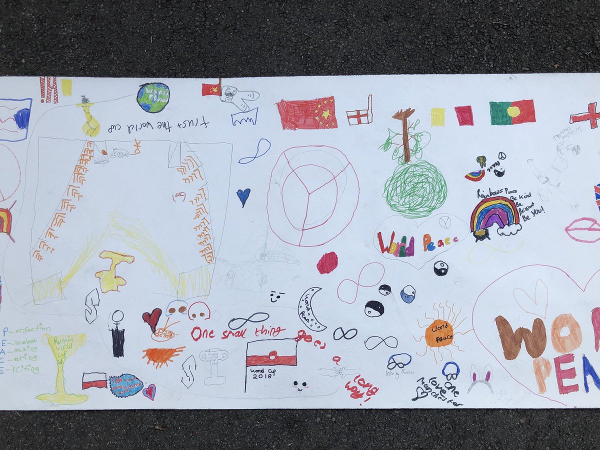 MissRReece's tweet photo. What a beautiful homage to the #WorldCup and an #unitedworld! It was all about #peace and #love today in KS2 @StMarysRCSch when we celebrated the World Cup and how it’s bringing so many people #together https://t.co/UrZ9FCIymQ