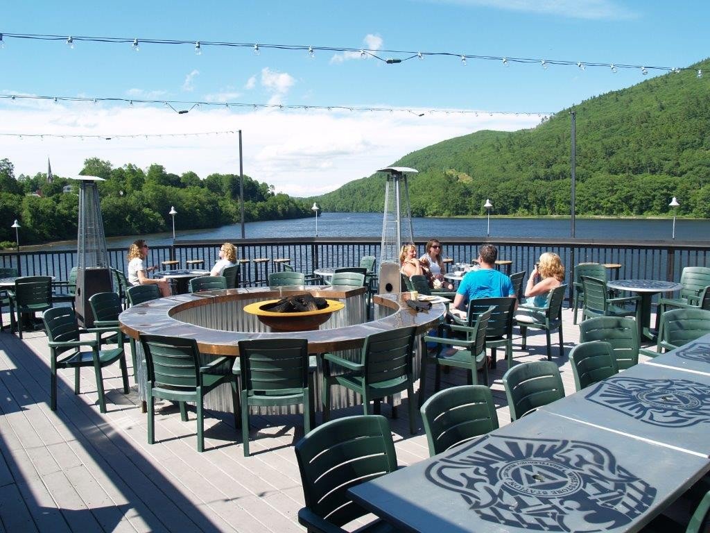 BrattleboroONE's tweet photo. @Expedia We love the rooftop deck at the Whetstone Station Restaurant &amp; Brewery in beautiful #Brattleboro #Vermont!  Sip a cool craft beer on the banks of the Connecticut River!  What could be better?! @WhetstoneBeer #expediachat #expediaviewfinder https://t.co/JtSv0XV03a