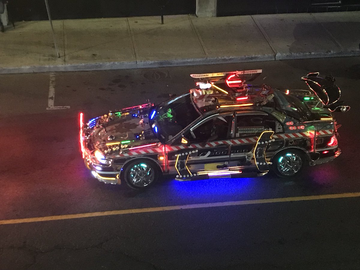 SuperDeanio's tweet photo. Had a pretty awesome dinner at #AtariOttawa and saw this insanely lit up car from the rooftop. https://t.co/5c6V2tIsCo