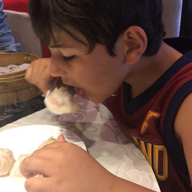 jemv's tweet photo. In his happy place, dumplings & home 😍 #calebdavidv #varugheseboys https://t.co/Cpvk2KMaPb