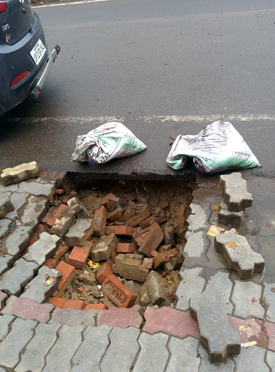 sumanads2006's tweet photo. Big pothole at roadside in A block Indira Nagar main road. Prone to serious accident especially in rainy season. Already raised complaint to Nagar Nigam. https://t.co/CfH8JKUlSV