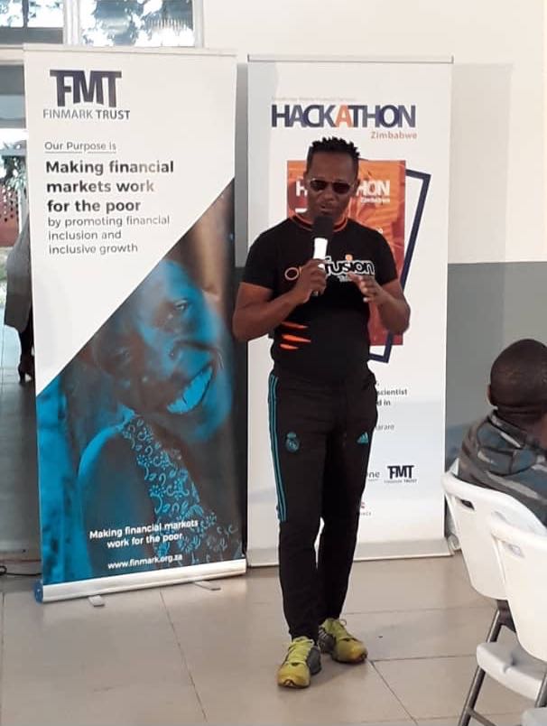 Finmarktrust's tweet photo. CEO of @NetOneCellular, Lazarus Muchenje @LazarusMuchenje, at the #OneMoneyHack in #Zimbabwe as he expresses to the young innovators the world class quality they wish to bring https://t.co/1cCB0QxeXT