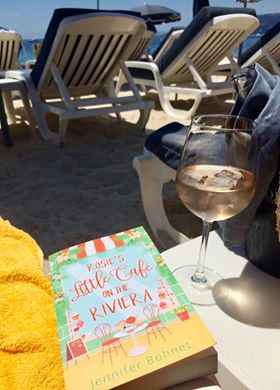 jenniewriter's tweet photo. A lovely Swedish reader took this photo of Rosie's Little Cafe on the Riviera Found your book in a lovely little bookshop in Antibes. Never heard of you before so this was the first book of yours that I read. Loved it! And I had some rosé with Rosie in Juan-les-Pins! https://t.co/1Nb3gxbGly