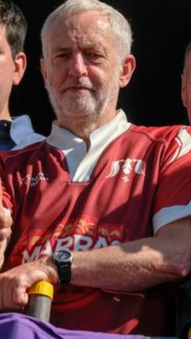 RussGuy74's tweet photo. Excellent photo of  incumbent @UKLabour Prime Minister of the #UK @jeremycorbyn at @DurhamGala today sporting @MinerWear shirt on balcony of County cheering generations of miners/trade unionist check out minerwear web site ✊@DailyMirror @BBCLookNorth @itvcalendar @M_Star_Online https://t.co/la8snabYQy