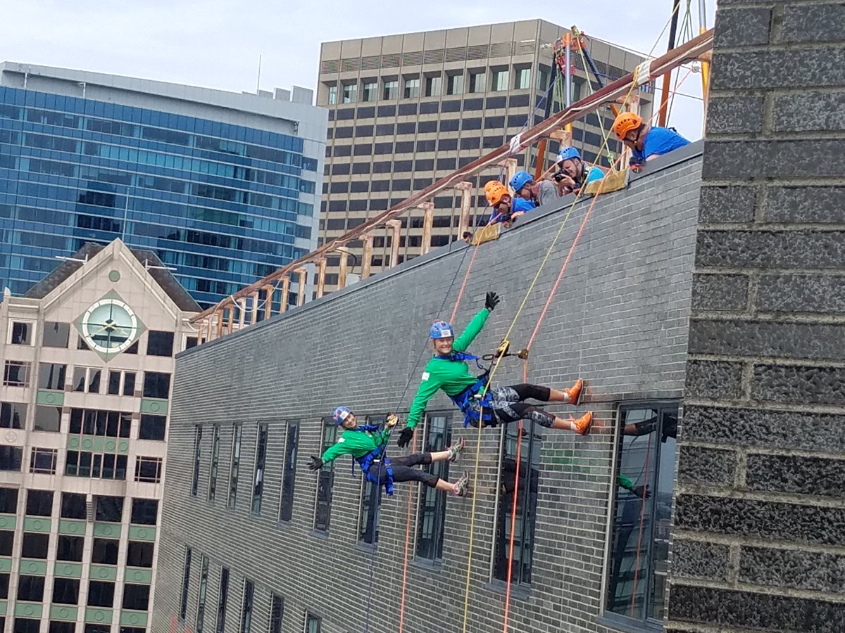 SpOlympicsMA's tweet photo. Why not make it fun when you're rappeling down the side of a 22-story building? #OTEBoston #OverTheEdge https://t.co/NoEqho7J7V