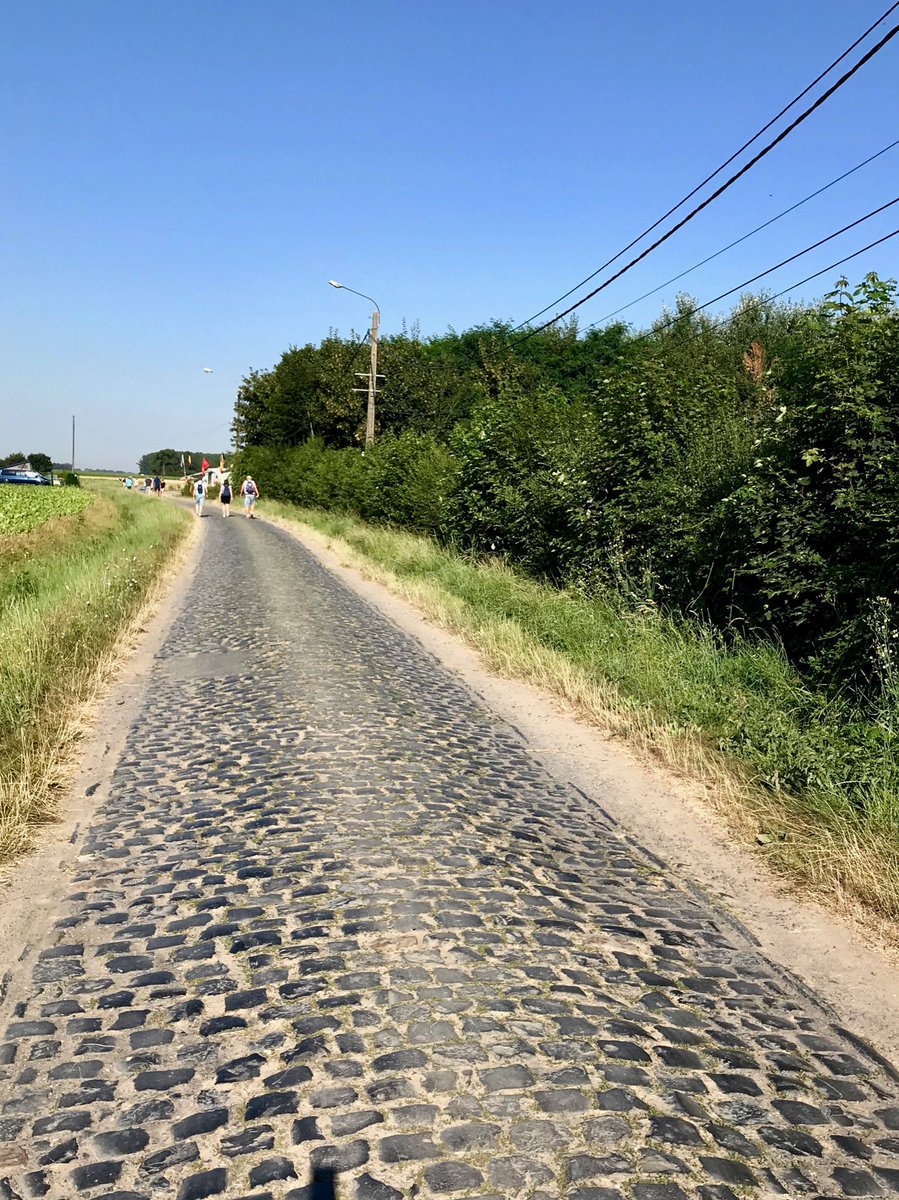 618Falahey's tweet photo. The blue granite cobbles of Camphin-en-Pévèle. #superslippery #punctures #SBSTDF https://t.co/8DLP4aPIN2