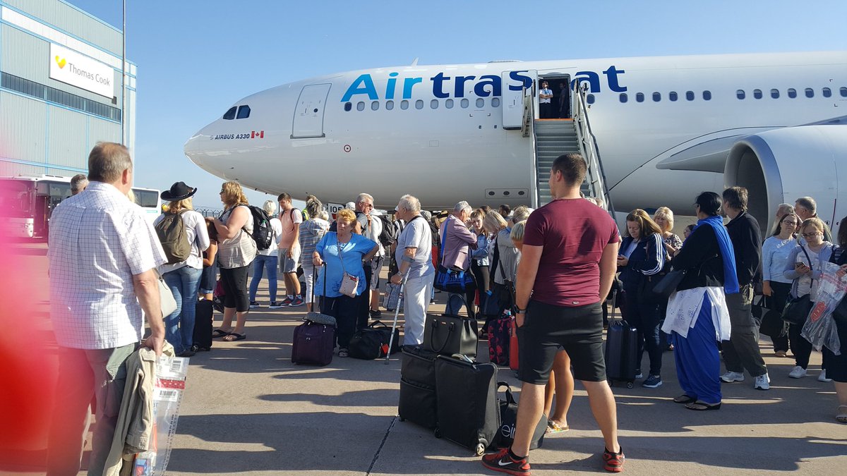 viverarma's tweet photo. Absolute chaos at Manchester airport, stood on the runway an hour after we landed waiting for a bus to the terminal! Now 50 mins waiting for the cases!! Shame on you @manairport https://t.co/kyoiR5i3kZ