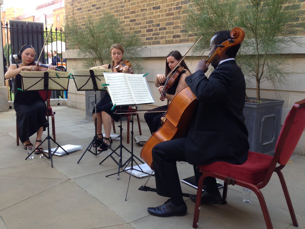 MaxK_J's tweet photo. #FABstrats string quartet chilling the atmosphere as ever @FlightGlobal https://t.co/smWBflLKz5