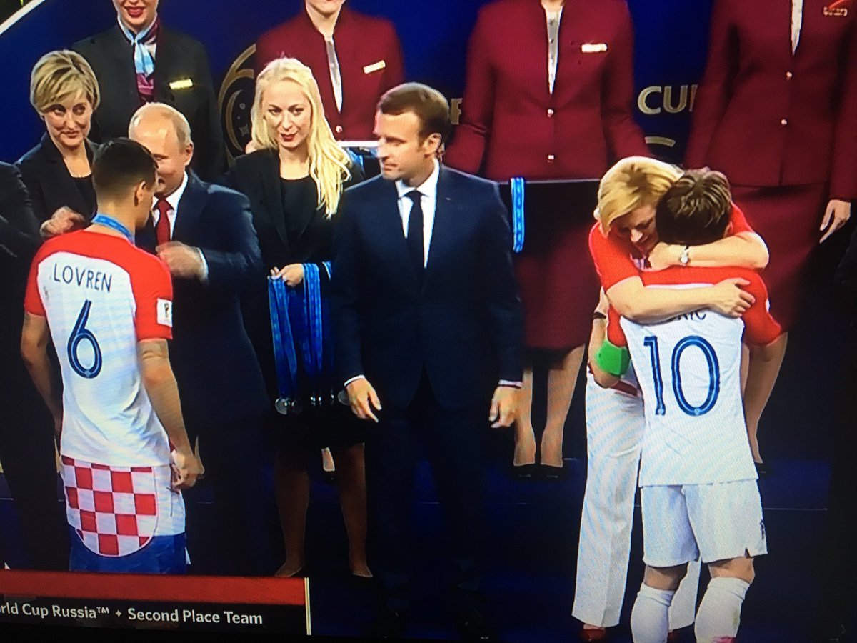 Kolinda Grabar Kitarović the embrace of a nation. Love this woman #WorldCup2018   Such an awesome heart.